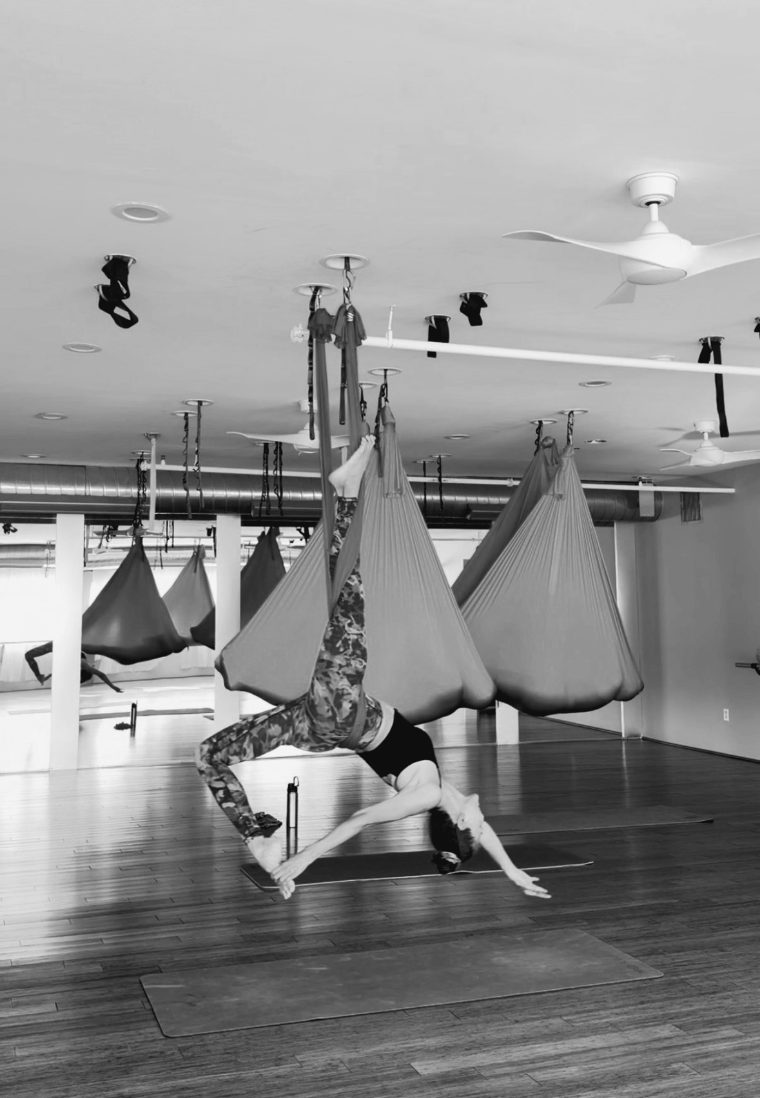 Students in the blue aerial hammocks.